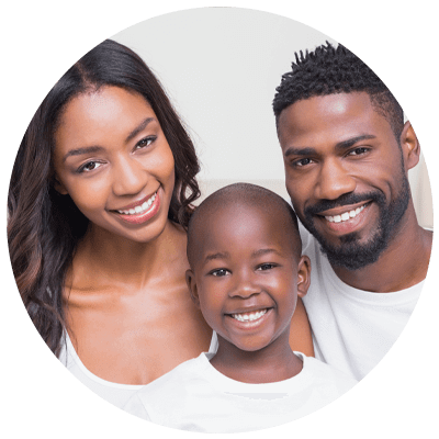 family smiling after dental procedure